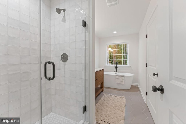 13191 Scotts Ml, Culpeper, VA 22701 - bathroom featuring a stall shower, a soaking tub, tile patterned flooring, and recessed lighting