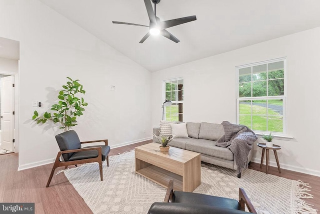 13191 Scotts Ml, Culpeper, VA 22701 - living area with healthy amount of natural light, ceiling fan, baseboards, wood finished floors, and vaulted ceiling
