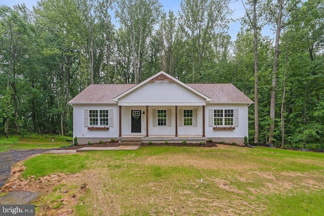 13191 Scotts Ml, Culpeper, VA 22701 - modern farmhouse with a porch, a front yard, and roof with shingles