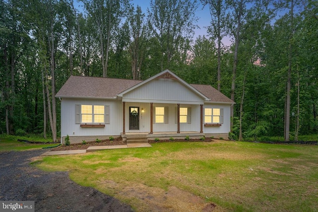 13191 Scotts Ml, Culpeper, VA 22701 - view of front of home featuring a porch, a front yard, and roof with shingles