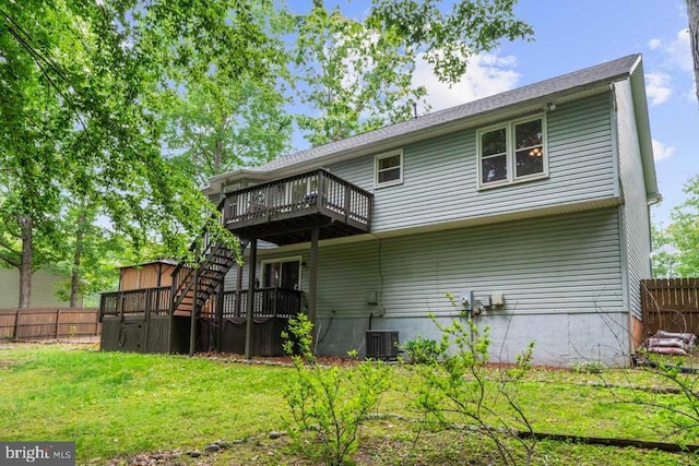 10603 Eden Brook Dr, Spotsylvania, VA 22553 - back of property with stairs, a wooden deck, and central air condition unit