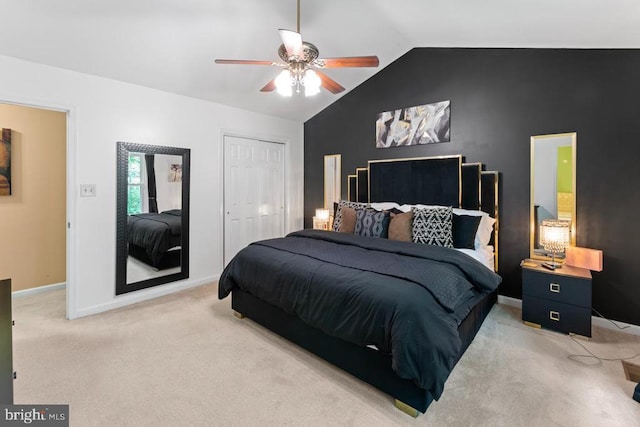 10603 Eden Brook Dr, Spotsylvania, VA 22553 - bedroom featuring light colored carpet, vaulted ceiling, a closet, baseboards, and ceiling fan