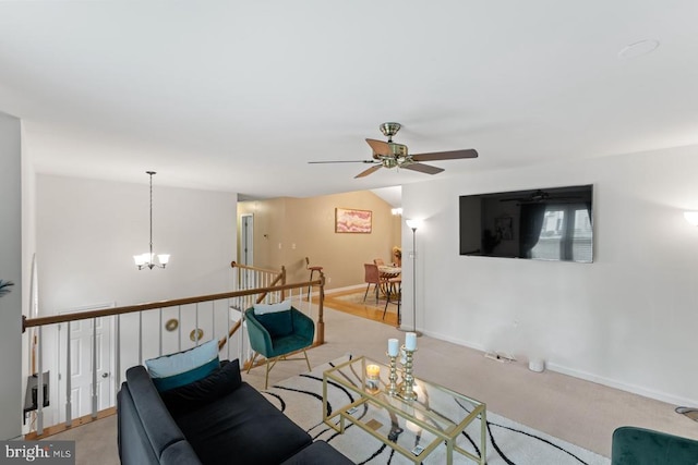 10603 Eden Brook Dr, Spotsylvania, VA 22553 - living area featuring ceiling fan, a chandelier, baseboards, and carpet