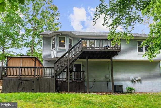 10603 Eden Brook Dr, Spotsylvania, VA 22553 - rear view of property featuring a wooden deck, stairs, and a lawn