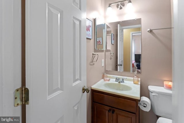 10603 Eden Brook Dr, Spotsylvania, VA 22553 - half bathroom featuring vanity and toilet