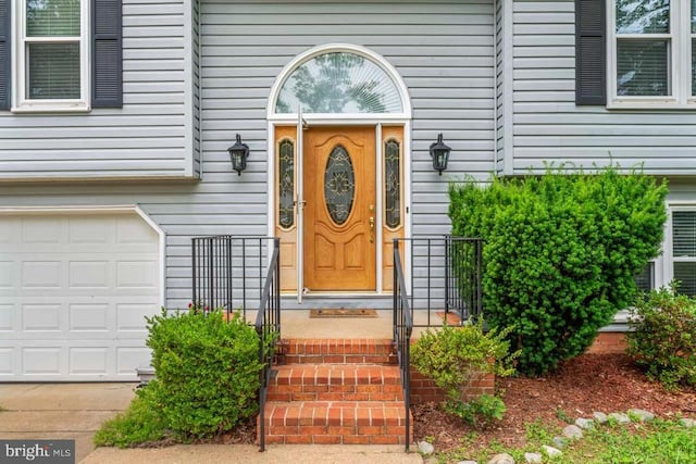 10603 Eden Brook Dr, Spotsylvania, VA 22553 - entrance to property with a garage