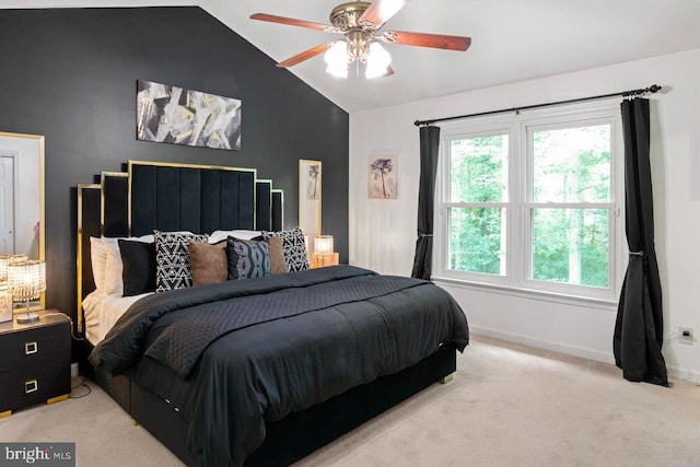 10603 Eden Brook Dr, Spotsylvania, VA 22553 - bedroom featuring lofted ceiling, multiple windows, light colored carpet, baseboards, and ceiling fan