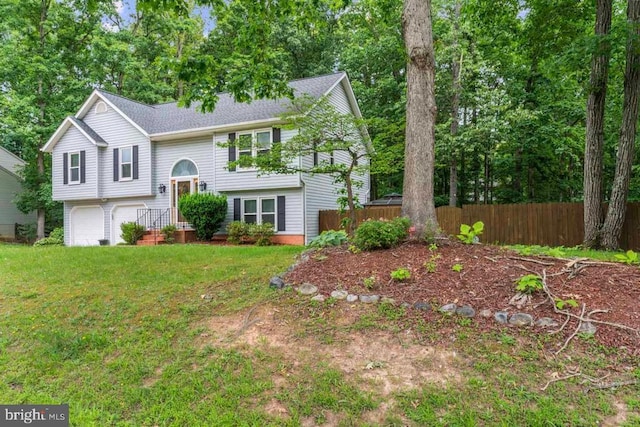 10603 Eden Brook Dr, Spotsylvania, VA 22553 - split foyer home with an attached garage and a shingled roof