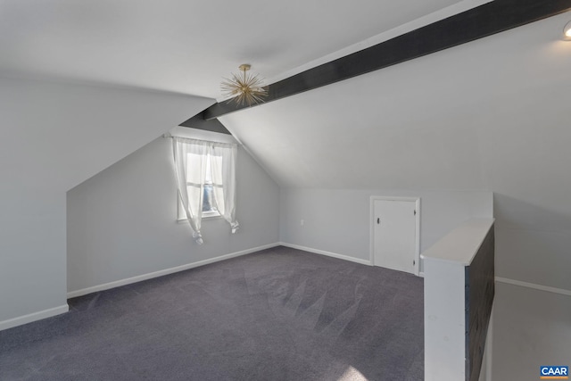 bonus room featuring lofted ceiling, baseboards, and dark carpet