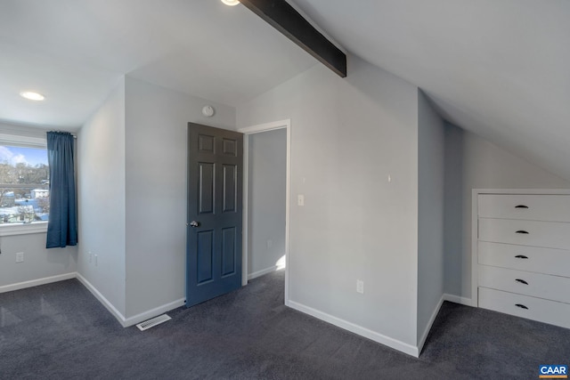bonus room with dark colored carpet, baseboards, visible vents, and vaulted ceiling with beams