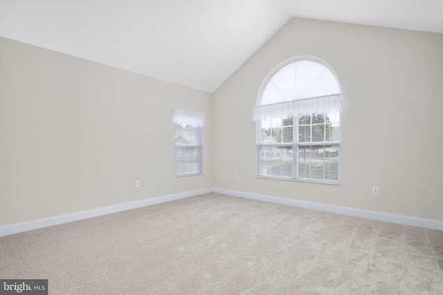 6231 Autumn Leaf Dr, Fredericksburg, VA 22407 - unfurnished room featuring vaulted ceiling, light carpet, and baseboards