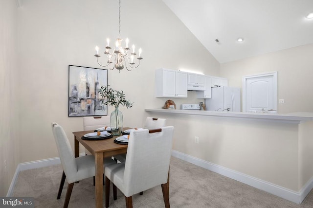 6231 Autumn Leaf Dr, Fredericksburg, VA 22407 - dining area featuring high vaulted ceiling, light carpet, a chandelier, and baseboards
