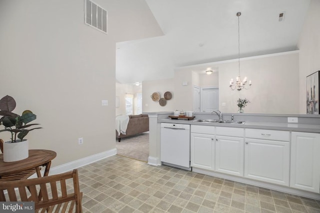 6231 Autumn Leaf Dr, Fredericksburg, VA 22407 - kitchen with white dishwasher, a sink, a chandelier, white cabinetry, and baseboards