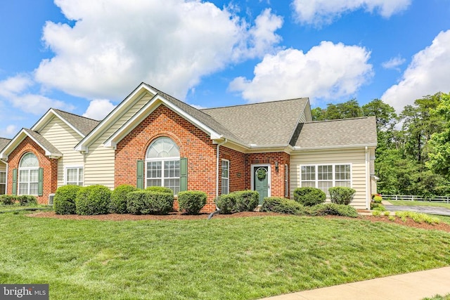 6231 Autumn Leaf Dr, Fredericksburg, VA 22407 - view of front facade with brick siding and roof with shingles