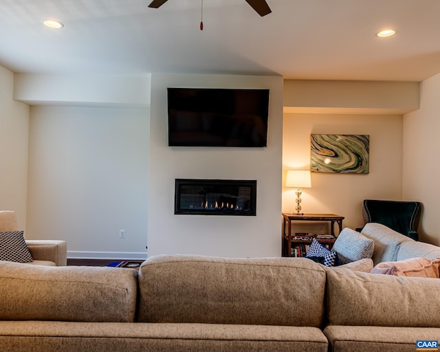 142 Junction Ln, Charlottesville, VA 22902 - living room with recessed lighting, a ceiling fan, a glass covered fireplace, and wood finished floors