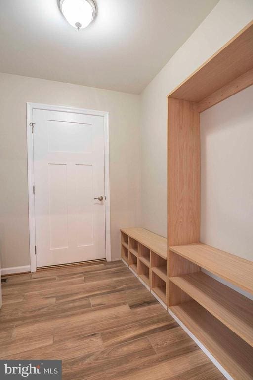 mudroom with hardwood / wood-style flooring