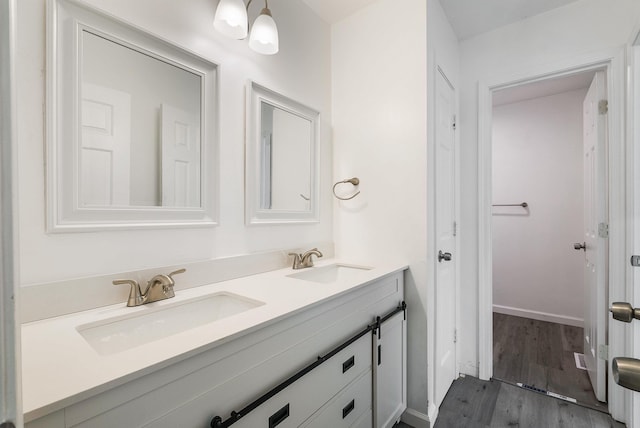 1114 Mountain View Dr, Harrisonburg, VA 22801 - bathroom with double vanity and wood finished floors