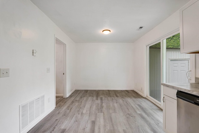 1114 Mountain View Dr, Harrisonburg, VA 22801 - unfurnished dining area with light wood finished floors and baseboards
