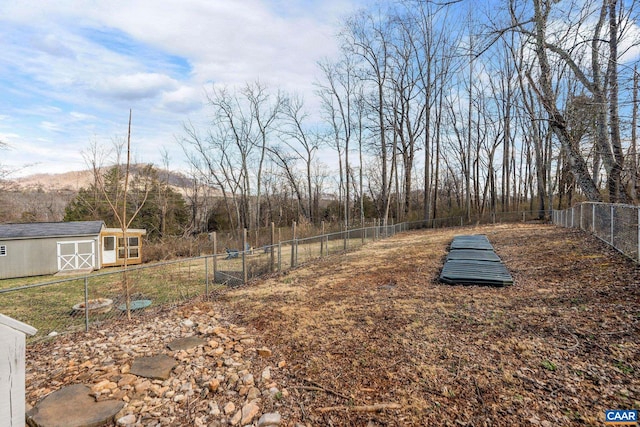 57 Pounding Branch Rd, Afton, VA 22920 - view of yard featuring a mountain view, an outbuilding, fence, and a shed