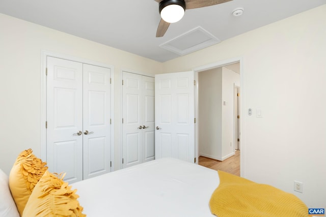 57 Pounding Branch Rd, Afton, VA 22920 - bedroom with attic access, two closets, ceiling fan, light wood finished floors, and baseboards