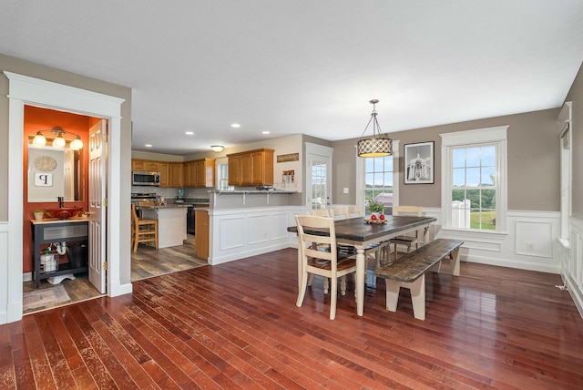 118 Wexford St, Staunton, VA 24401 - dining area with dark wood-type flooring, wainscoting, a decorative wall, and recessed lighting