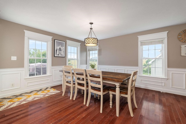 118 Wexford St, Staunton, VA 24401 - dining room with a wainscoted wall, dark wood-style flooring, and a decorative wall