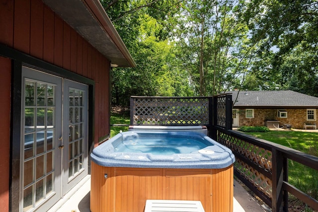 123 Fishermans Ln, Luray, VA 22835 - deck featuring a hot tub, french doors, and view of wooded area