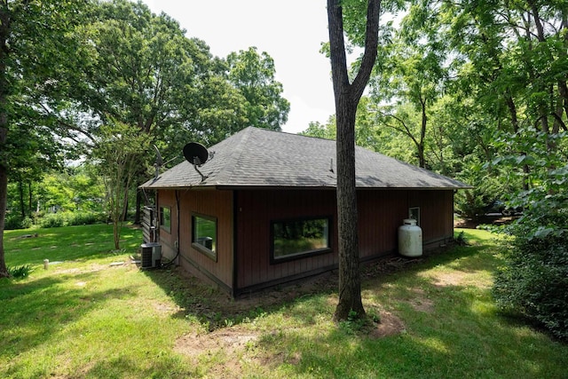123 Fishermans Ln, Luray, VA 22835 - view of property exterior with a yard and roof with shingles