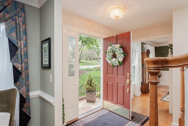 225 Divot Dr, Harrisonburg, VA 22802 - foyer entrance featuring light wood finished floors, crown molding, and baseboards