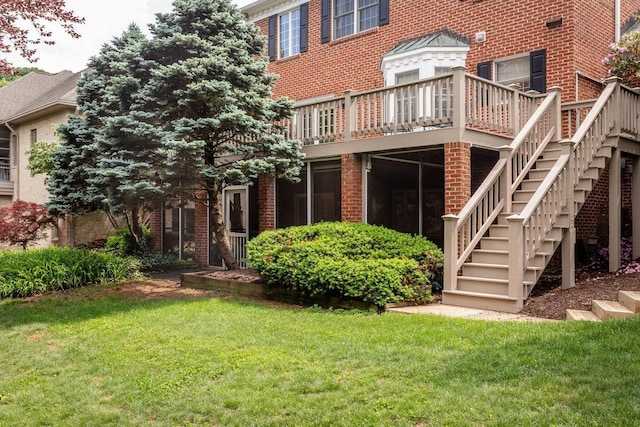 225 Divot Dr, Harrisonburg, VA 22802 - rear view of property with a lawn, stairway, brick siding, and a wooden deck