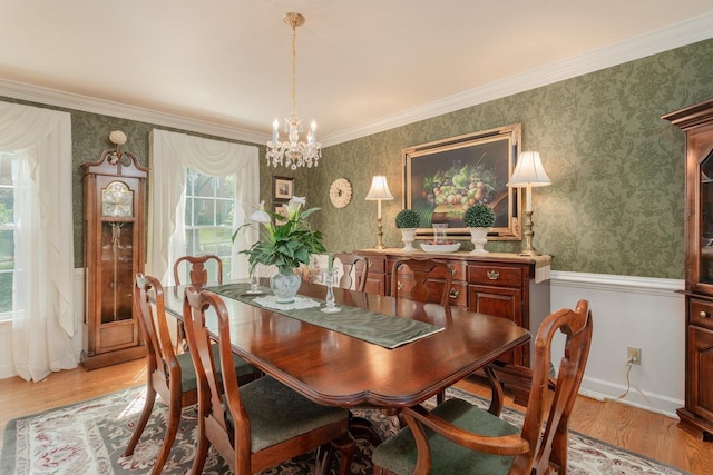 225 Divot Dr, Harrisonburg, VA 22802 - dining space featuring wallpapered walls, a chandelier, light wood-type flooring, a wainscoted wall, and crown molding
