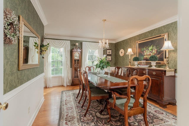 225 Divot Dr, Harrisonburg, VA 22802 - dining area featuring wallpapered walls, a chandelier, crown molding, light wood-type flooring, and baseboards