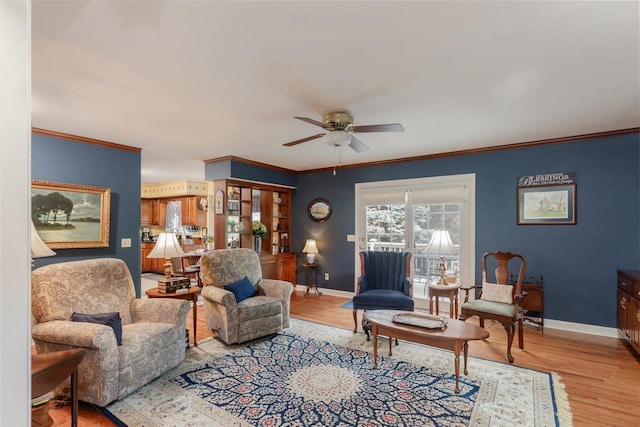 225 Divot Dr, Harrisonburg, VA 22802 - living room featuring ceiling fan, baseboards, light wood-type flooring, and crown molding