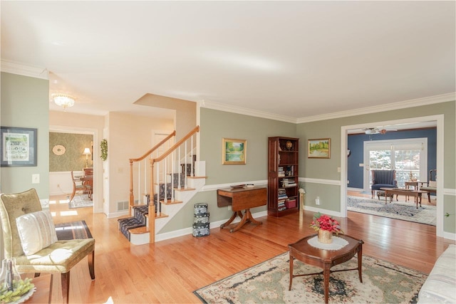 225 Divot Dr, Harrisonburg, VA 22802 - living room featuring light wood-type flooring, stairway, crown molding, a ceiling fan, and baseboards