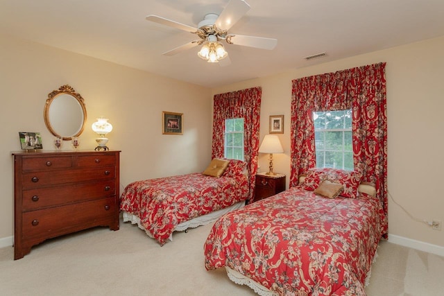225 Divot Dr, Harrisonburg, VA 22802 - bedroom with light carpet, a ceiling fan, and baseboards