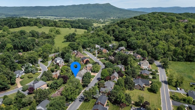 225 Divot Dr, Harrisonburg, VA 22802 - view of property location with a heavily wooded area, nearby suburban area, and a mountainous background