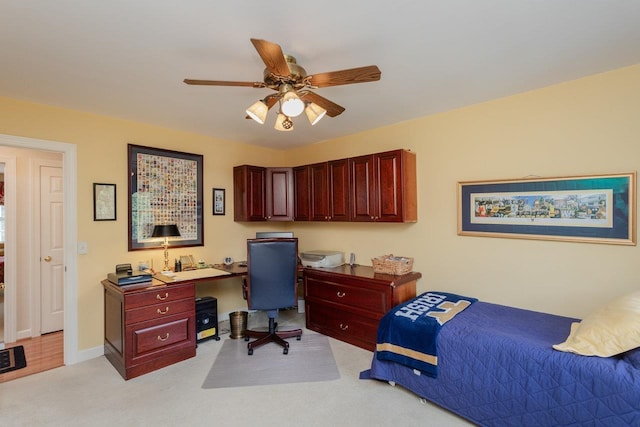 225 Divot Dr, Harrisonburg, VA 22802 - bedroom with an office area, light carpet, and a ceiling fan