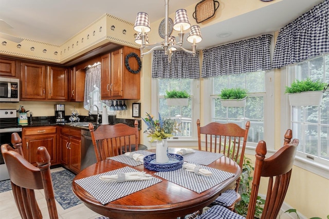 225 Divot Dr, Harrisonburg, VA 22802 - dining area with a chandelier and light tile patterned flooring