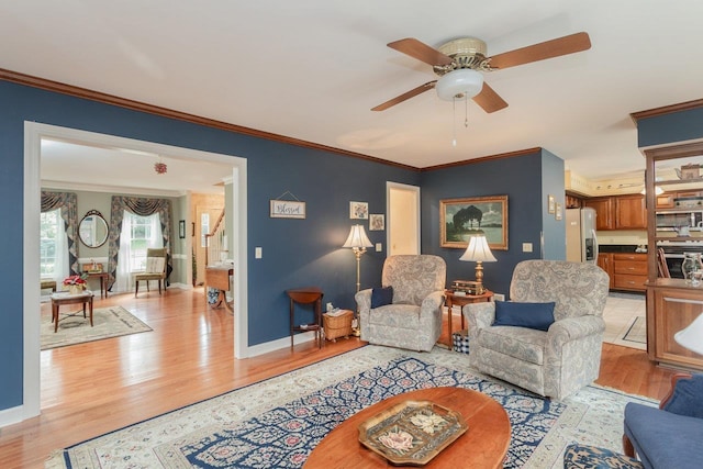 225 Divot Dr, Harrisonburg, VA 22802 - living area with light wood-style floors, ceiling fan, crown molding, and baseboards