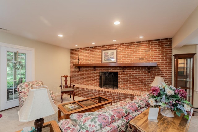 225 Divot Dr, Harrisonburg, VA 22802 - carpeted living room with a brick fireplace and recessed lighting