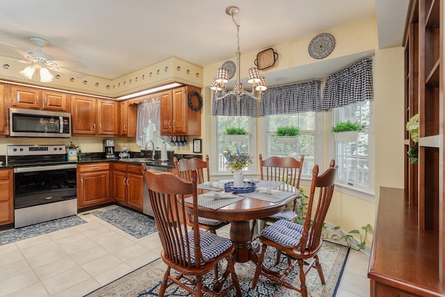 225 Divot Dr, Harrisonburg, VA 22802 - dining room with a chandelier, a ceiling fan, and light tile patterned floors