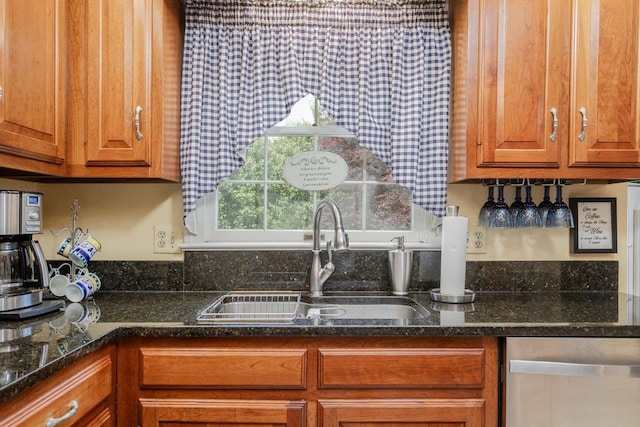225 Divot Dr, Harrisonburg, VA 22802 - kitchen with a sink, dishwasher, brown cabinetry, and dark stone counters