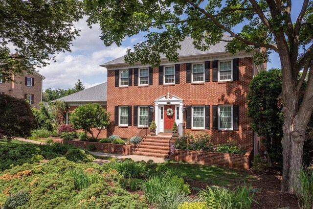 225 Divot Dr, Harrisonburg, VA 22802 - georgian-style home with brick siding and roof with shingles
