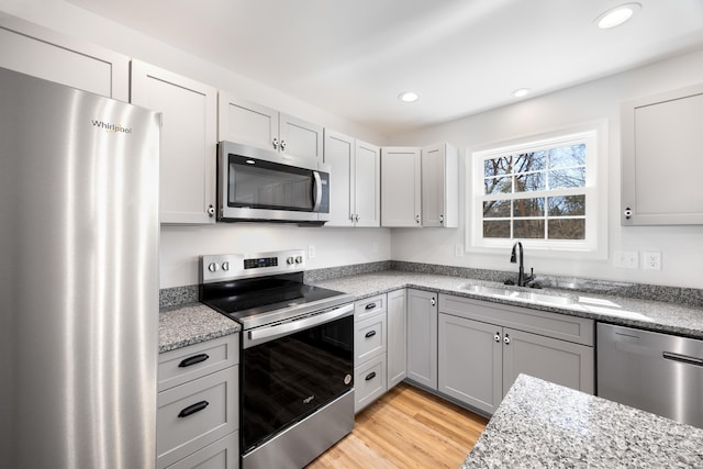 TBD Senedo Rd, Mount Jackson, VA 22842 - kitchen featuring appliances with stainless steel finishes, recessed lighting, light wood-type flooring, light stone counters, and gray cabinetry