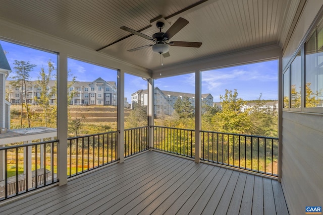 196 Thicket Run Pl, Charlottesville, VA 22911 - unfurnished sunroom featuring a residential view and a ceiling fan