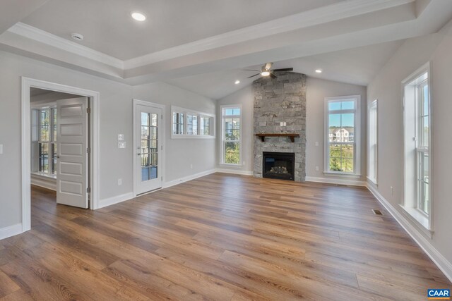 196 Thicket Run Pl, Charlottesville, VA 22911 - unfurnished living room featuring ceiling fan, vaulted ceiling, wood finished floors, and a healthy amount of sunlight