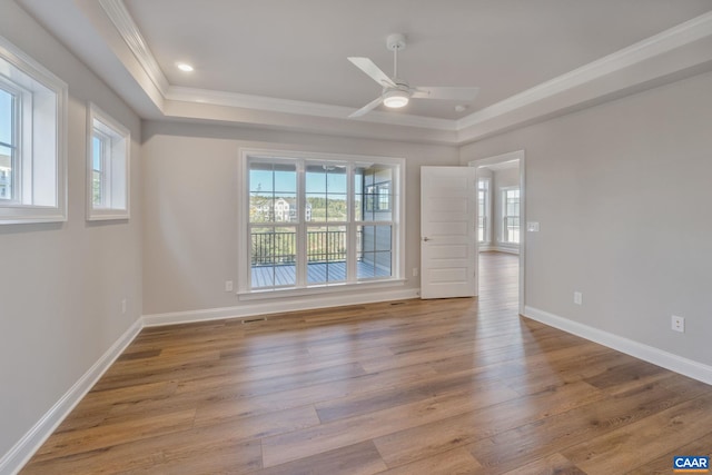 196 Thicket Run Pl, Charlottesville, VA 22911 - unfurnished room with ornamental molding, a tray ceiling, and wood finished floors