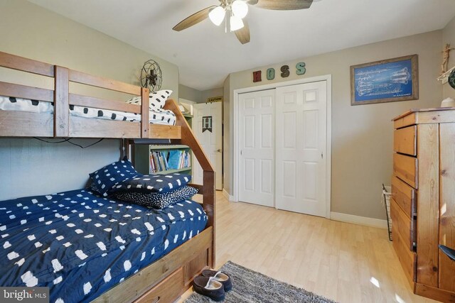 7329 Cloverhill Rd, Spotsylvania, VA 22551 - bedroom featuring wood finished floors, a closet, baseboards, and a ceiling fan