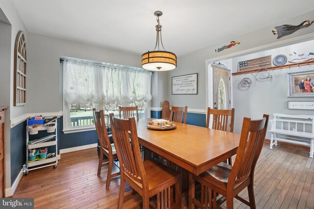 7329 Cloverhill Rd, Spotsylvania, VA 22551 - dining room with hardwood / wood-style flooring and baseboards