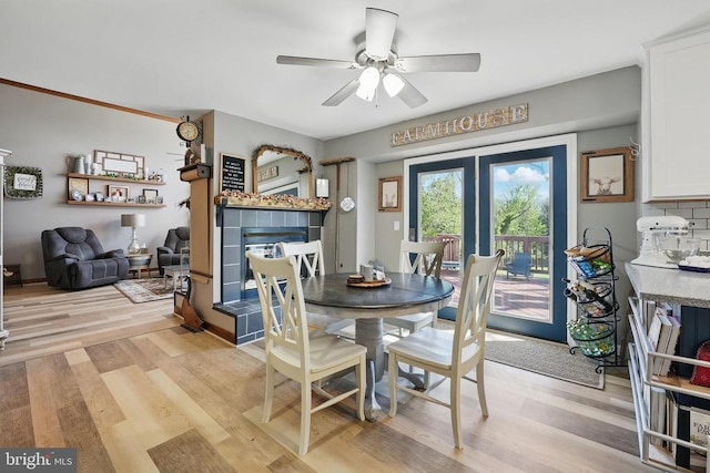 7329 Cloverhill Rd, Spotsylvania, VA 22551 - dining area featuring light wood-style flooring and a ceiling fan